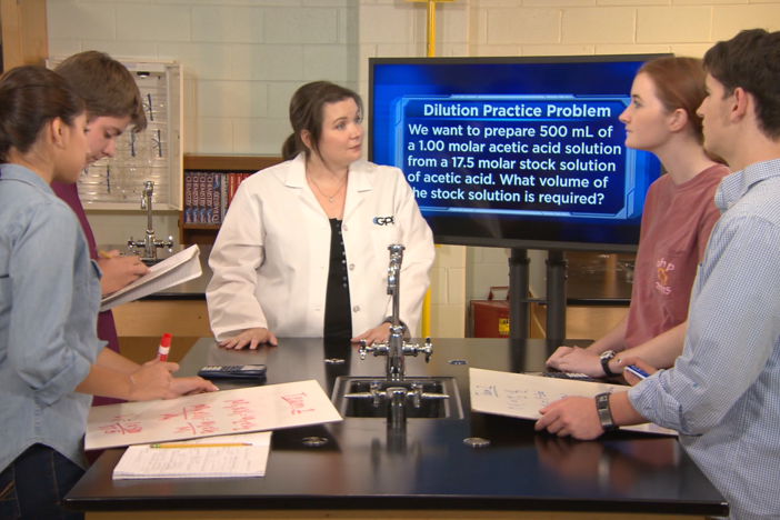 In segment D, the teacher and students discuss the results from the molarity.