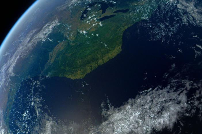 Scientists dig up ancient clams from the ocean 90 miles from the nearest beach.