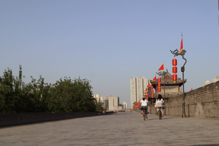 Another sweltering hot day in filming in on the ancient city walls of Xi'an.