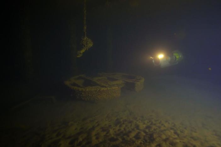 The ROV enters a region of the Arizona unseen since her sinking—the admiral’s cabin.  
