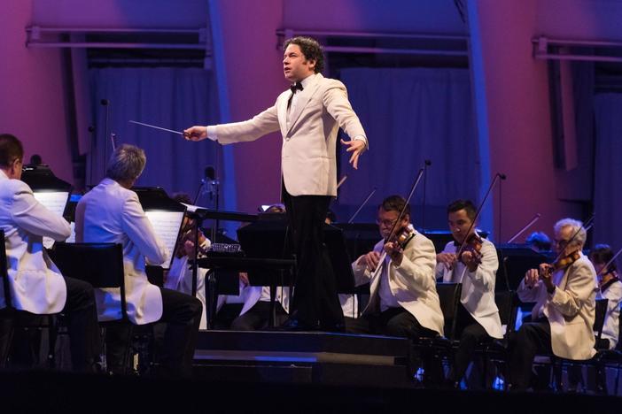 Dudamel leads the LA Philharmonic in Astor Piazzolla's Adios nonino while dancers tango.