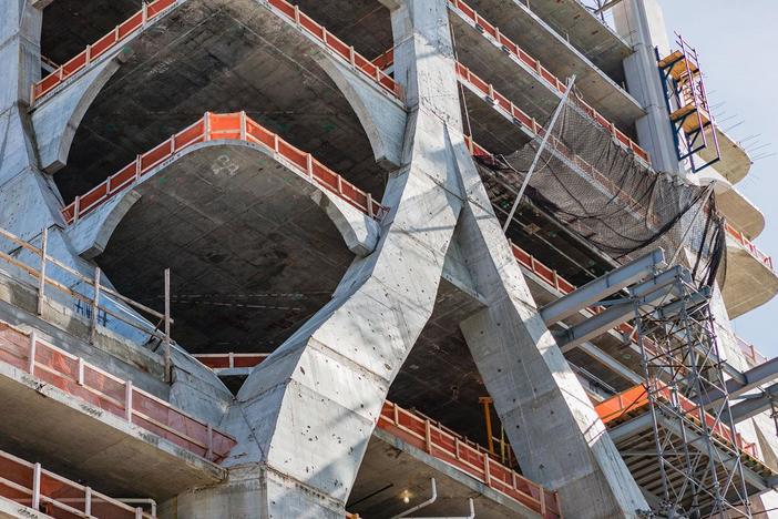 The exoskeleton of the Scorpion Tower is created using glass fiber reinforced concrete.
