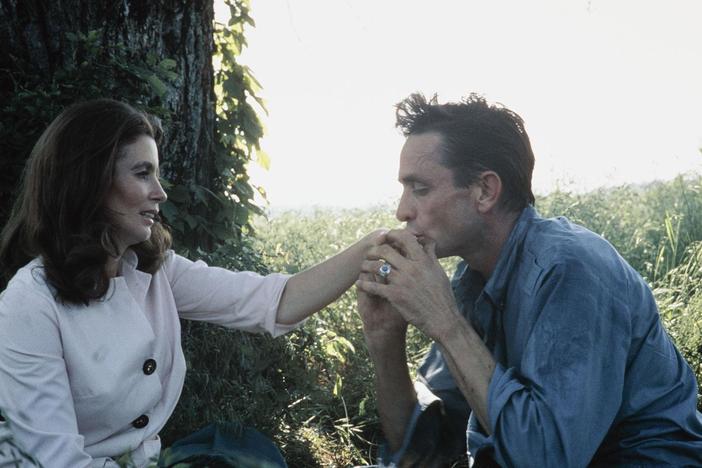 Explore the influence of the Carter Cash family and the theme of family in country music.