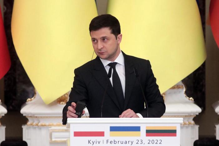 Ukrainians resist attack, as countries sanction Russia
