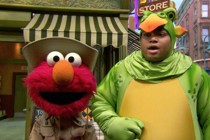 Elmo and Chris drop a mad dino beat on Sesame Street!