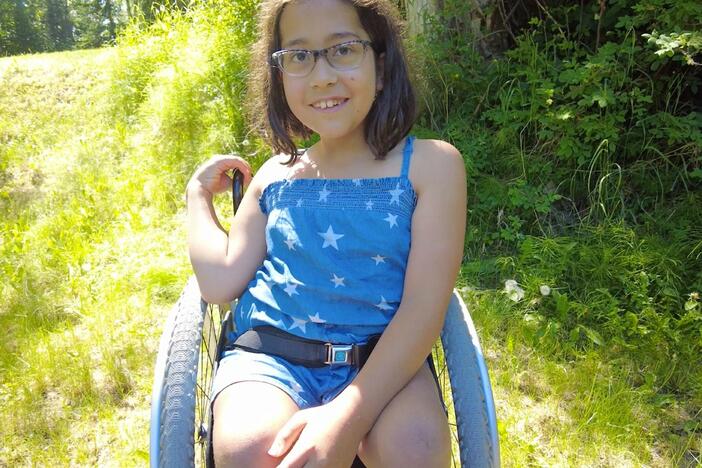 Naya uses her sparkly wheelchair to go to gymnastics class, physical therapy and beyond!