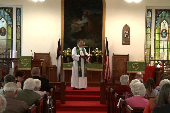 Both politician and pastor, he serves in the West Virginia senate and at three churches.