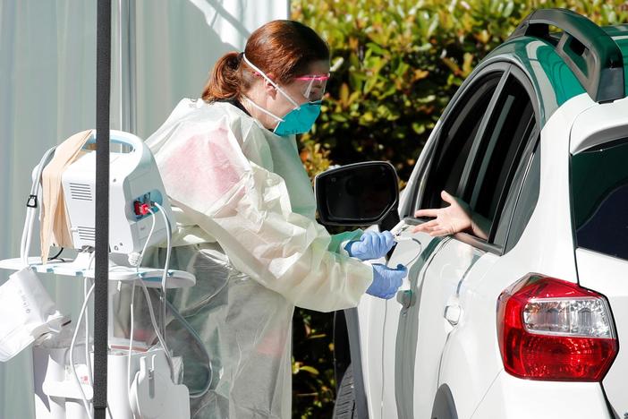 In the U.S. and across the globe, normal life shuts down amid pandemic