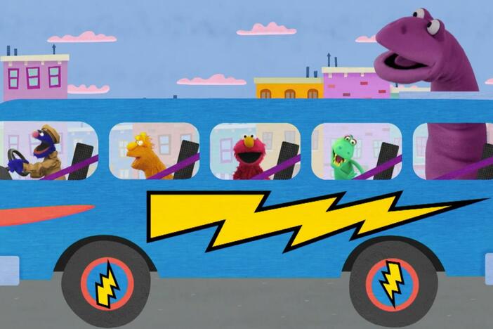 Sing the Wheels on Grover's Bus.