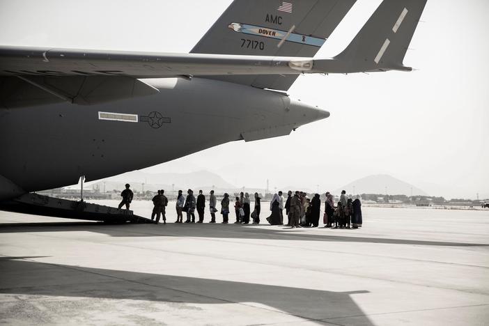 Afghans who fled their homes during the chaotic U.S. withdrawal reflect on the last year