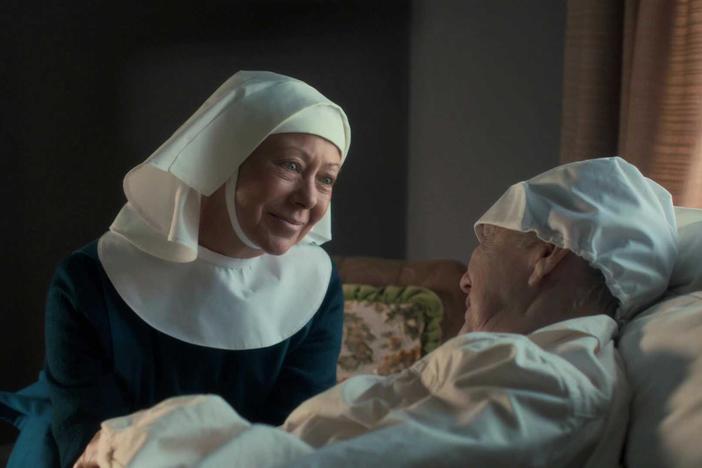 Sister Julienne meets Mother Superior at her bedside.