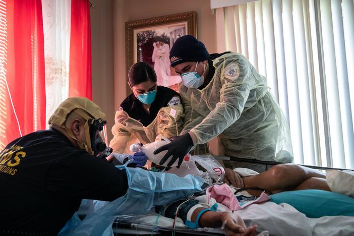 'It's about human beings.' This photographer's goal in documenting COVID-19