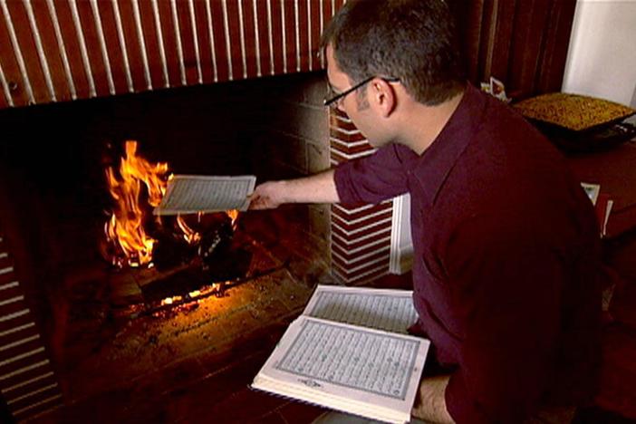 What is the proper way to dispose of a damaged or worn out sacred text?