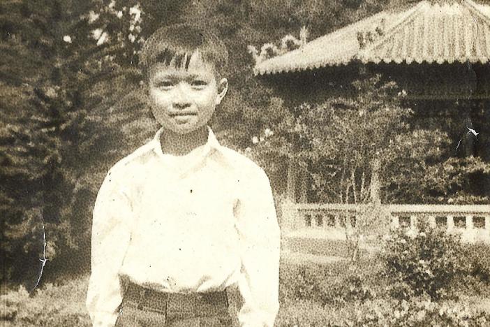 Nam tells of a boat journey from Vietnam and his arrival at a refugee camp.