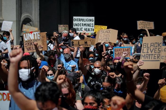 With mass protests over systemic racism, people trade 1 health risk for another