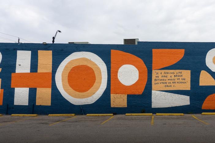 Learn about the concept, art and installation behind the mural in Dallas.