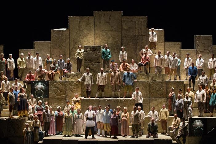 The chorus in Nabucco at The Met perform an opera number.