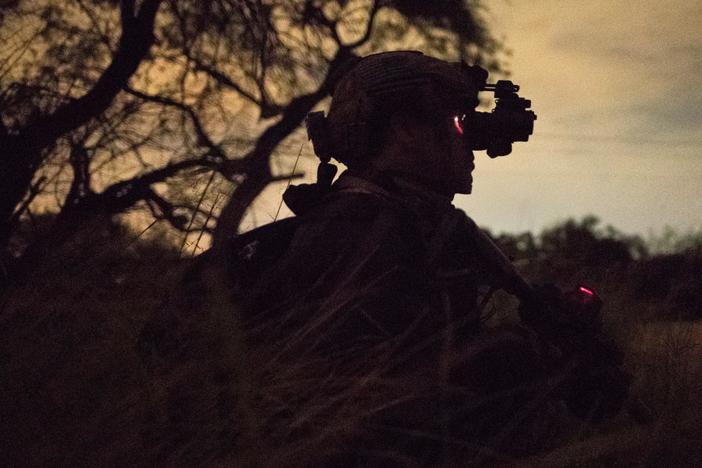 News Wrap: Dow rebounds from losses; Trump orders more troops to the border