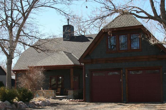 Why is a boxcar buried beneath this suburban kitchen?