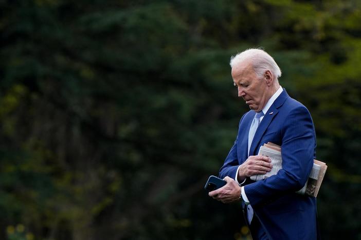 News Wrap: Government shutdown averted as Biden signs $1.2 trillion funding bill