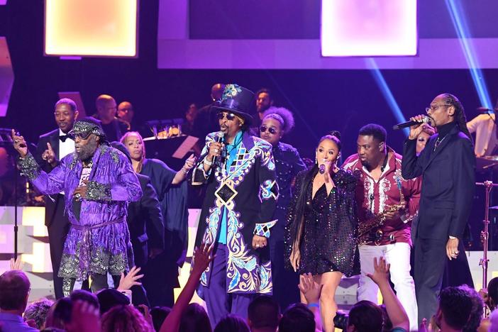 Watch an amazing ensemble of stars perform this funk-music favorite.