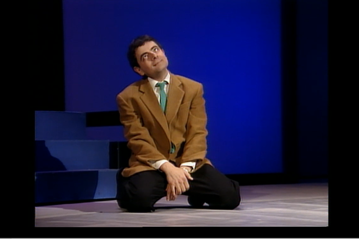 Mr. Bean ventures into the attic to look for an umbrella so he can go to the park.
