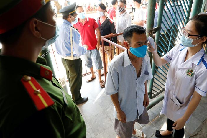 How Vietnam's authoritarian government succeeded at containing COVID-19