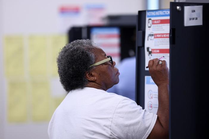 Will a divided Georgia stay blue on Election Day?