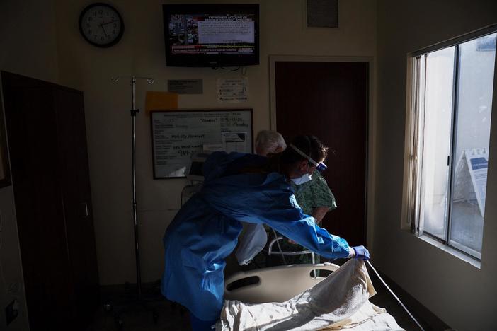 Rising COVID hospitalizations point to another summer surge in infections