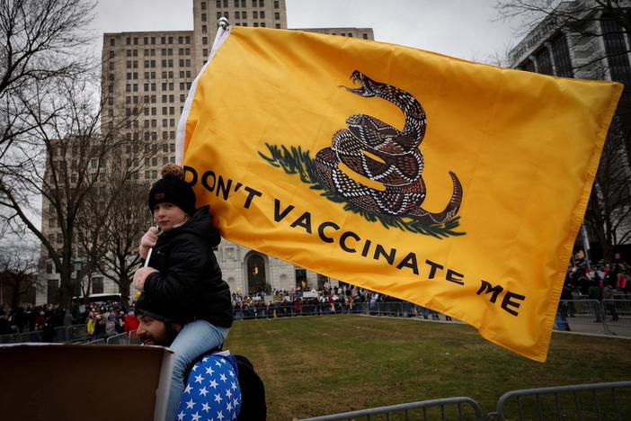 News Wrap: Texas judge blocks Biden vaccine mandate for federal workers