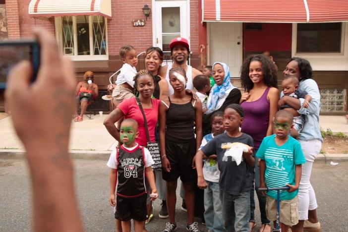 The community welcomes PJ home and celebrates her recovery with a block party.