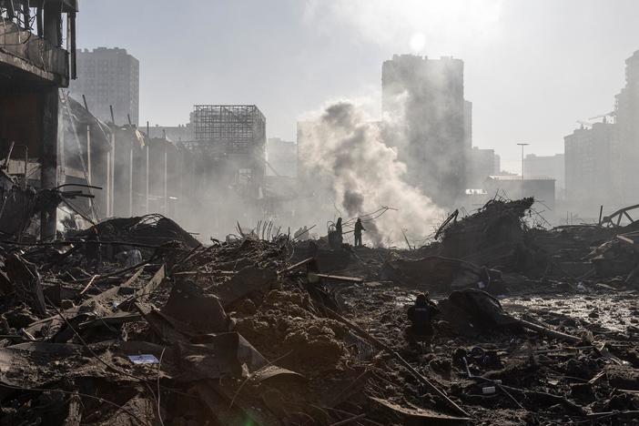 Ukraine claims to retake a critical Kyiv suburb as Russian forces intensify attacks