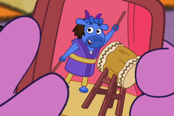 Leiko tells the Wombats about Taiko drums.
