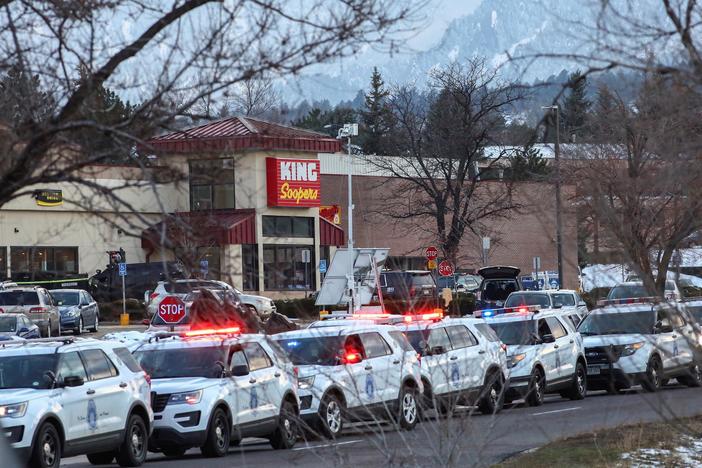 Suspect charged in Colorado shooting as Senate debates gun control