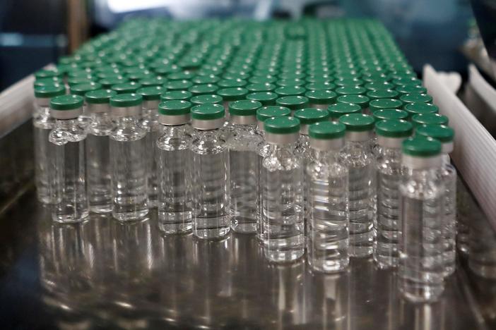 Healthcare workers, nursing homes should get COVID-19 vaccine earlier, CDC panel says