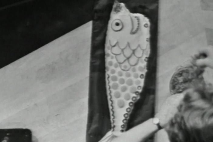 The French Chef's Julia Child demonstrates how to poach a salmon.