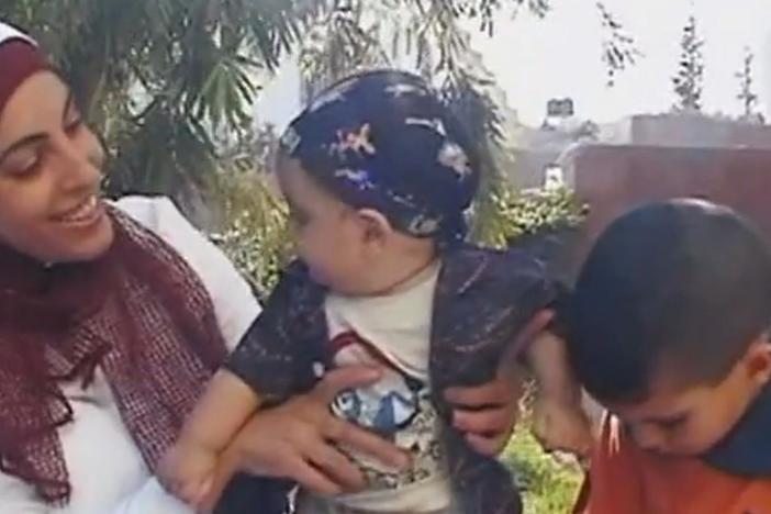 An introduction to Emad Burnat's family and their lives in Bil’in, a West Bank village. 