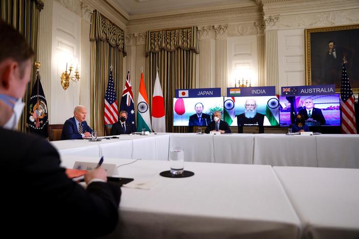 Biden moves up vaccine timeline in the U.S., vows to expand global supplies