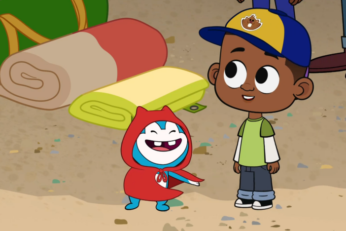 The Loops family plays a scavenger hunt, looking for red objects