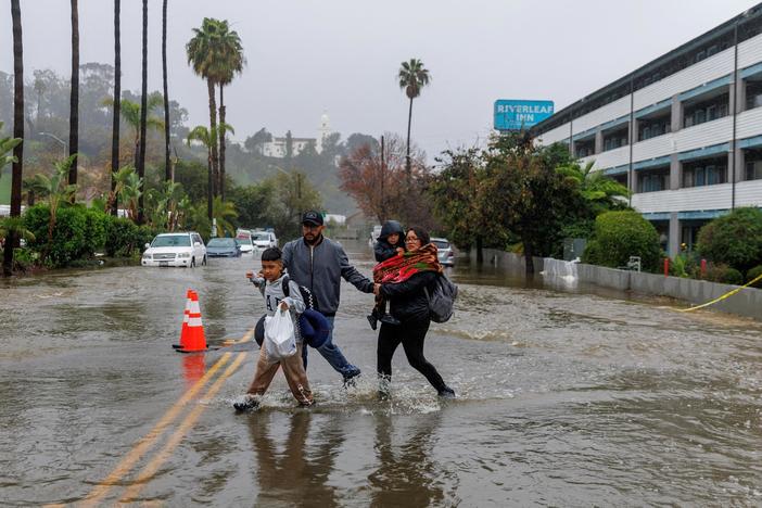 News Wrap: Biden tours flooding and storm damage in California