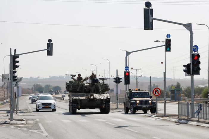 How thousands of Gazans became stranded in Israel when war started