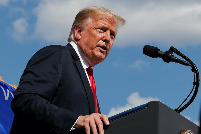Trump insists on using racist language. Will that approach win him support?