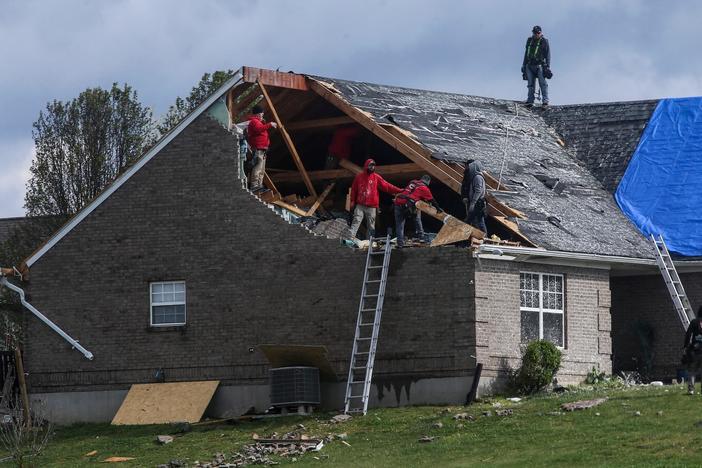 News Wrap: Storm system brings tornadoes to South and Midwest, snow to New England