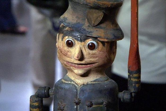 Marybeth Keene appraises a folk art whirligig, ca. 1890.