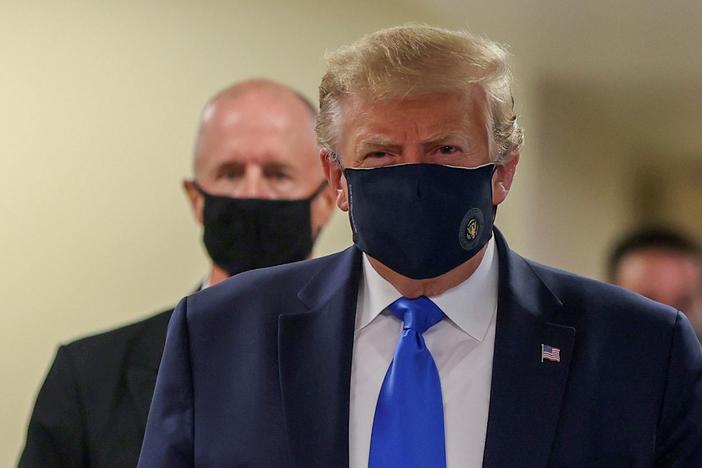 As coronavirus surges, Trump and White House attack Fauci