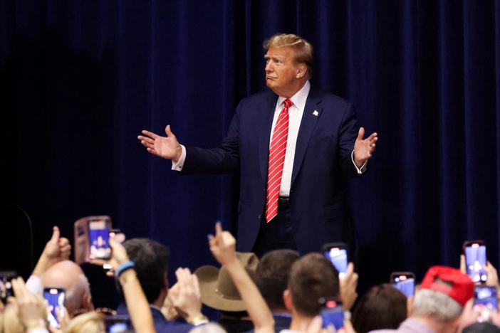 News Wrap: Judge tosses out some charges in Trump 2020 election interference case