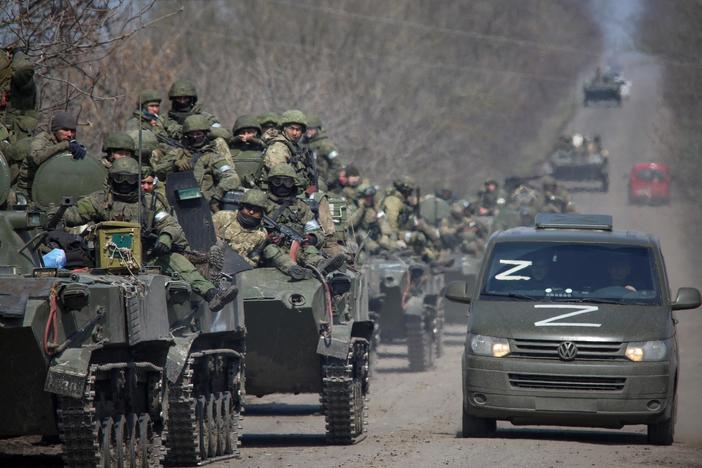 Biden accuses Russia of genocide as Putin warns the West about military aid in Ukraine