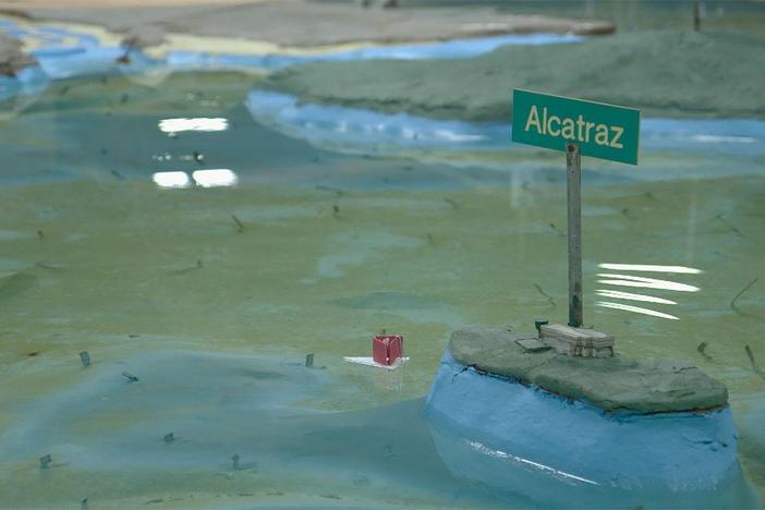 The Dutch scientists visit the physical model of the San Francisco Bay and delta system.