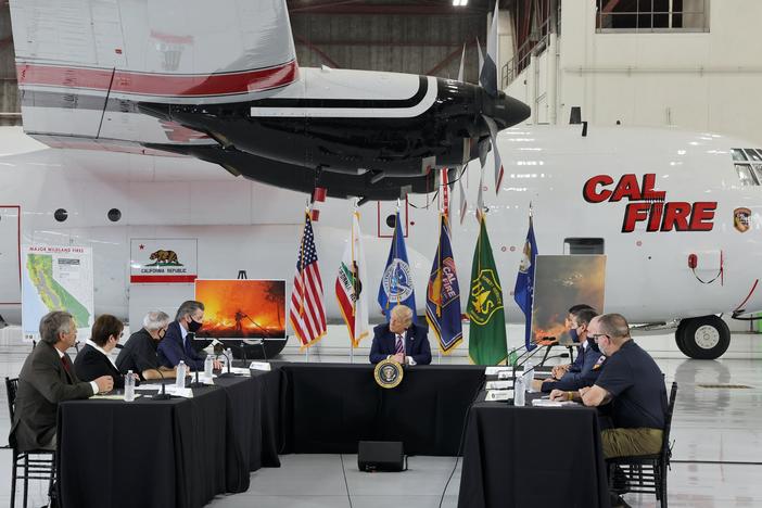 Western wildfires highlight divergent stances of Trump, Biden on climate change