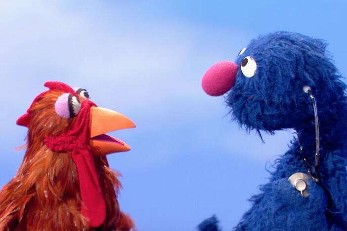 Grover listens to his heart beat.